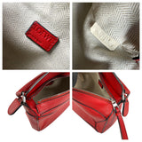 Pre-owned Loewe Red Pebbled Calfskin Leather Mini Puzzle Bag