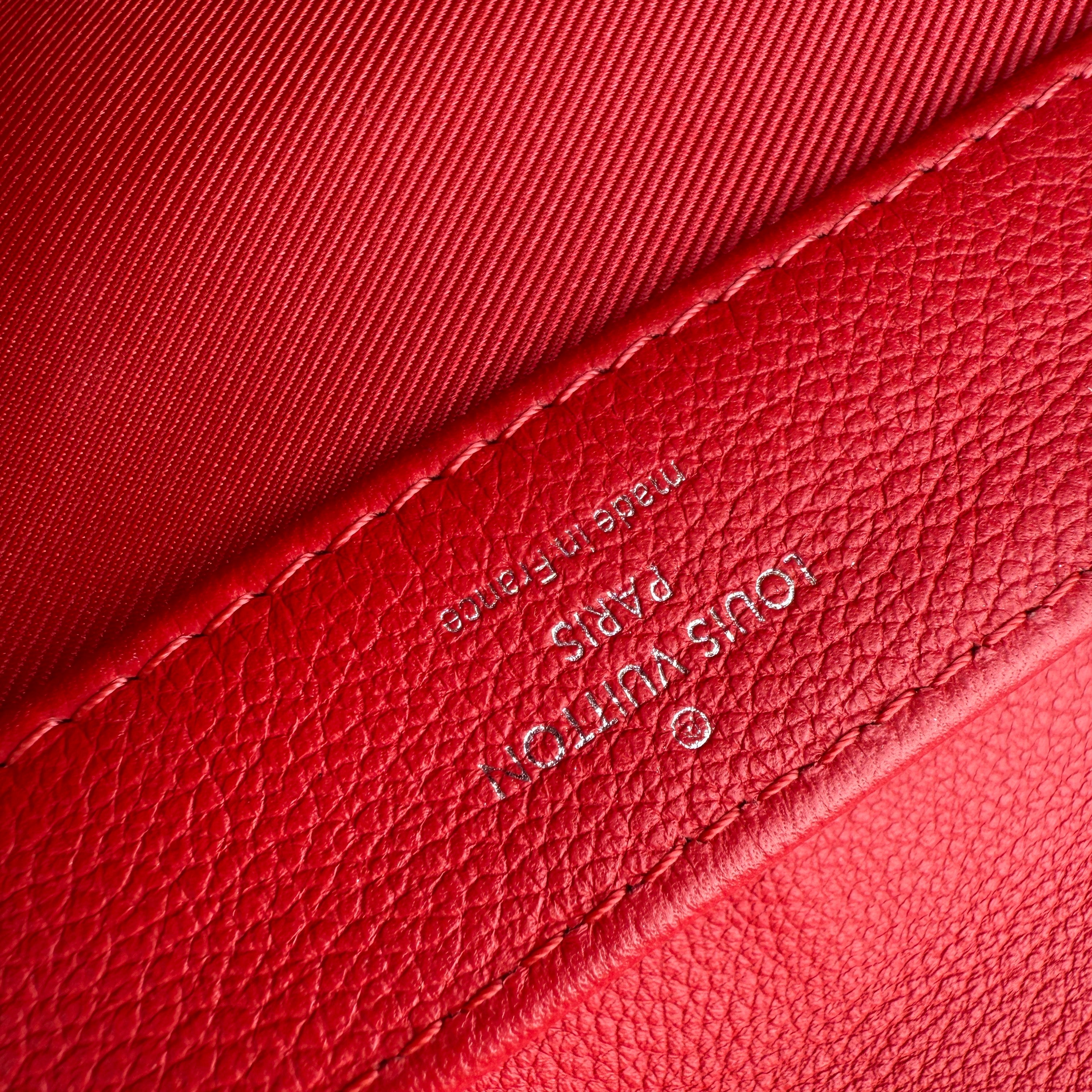 Pre-owned louis-vuitton-lockme-ii-top-handle-rubis-calfskin-bag-front