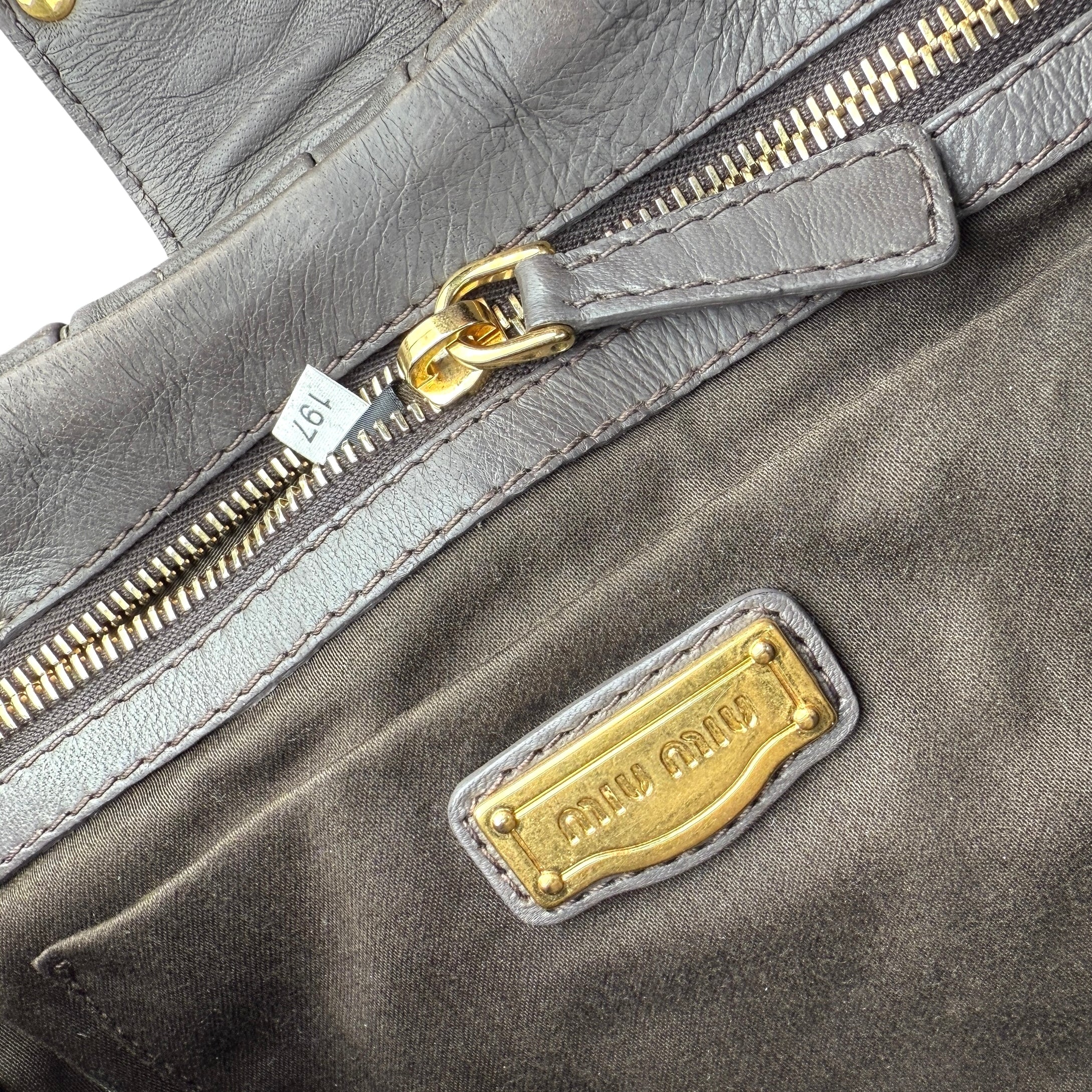 Pre-owned miu-miu-argilla-matelasse-tote-front-view