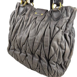 Pre-owned miu-miu-argilla-matelasse-tote-front-view