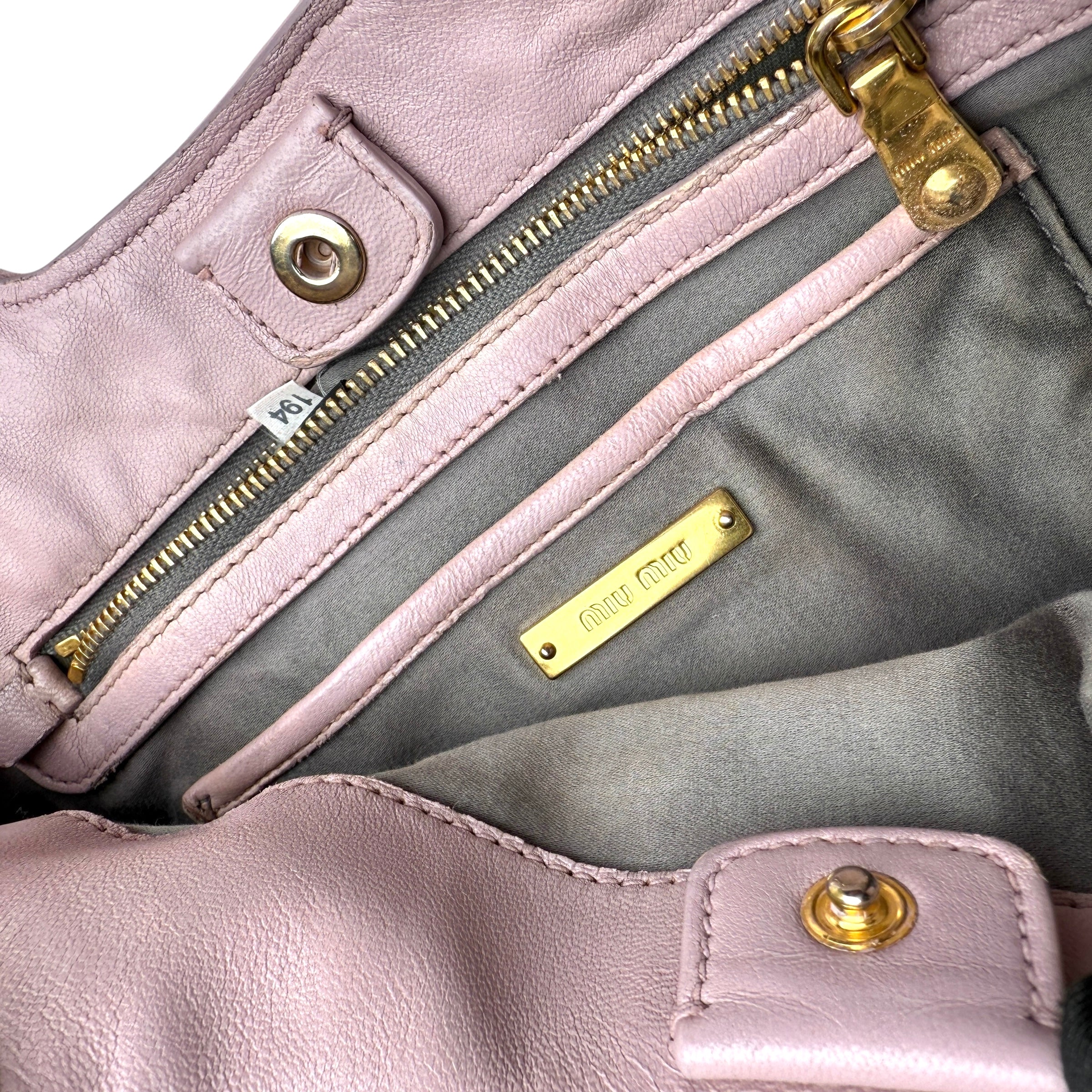 Pre-owned miu-miu-matelasse-tote-front-view
