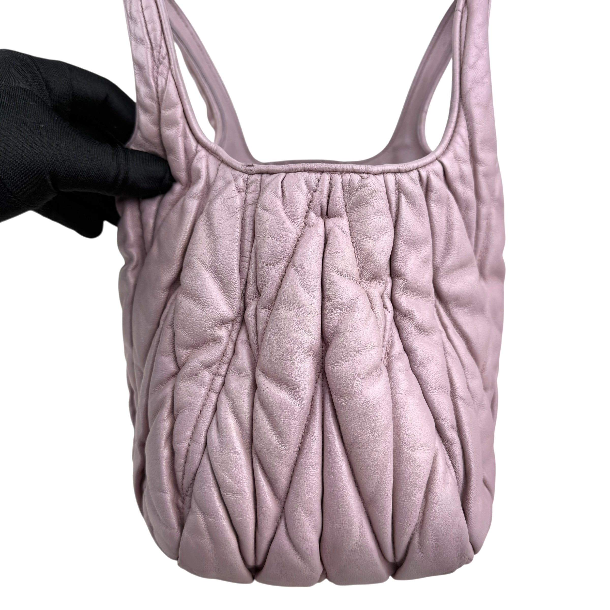 Pre-owned miu-miu-matelasse-tote-front-view