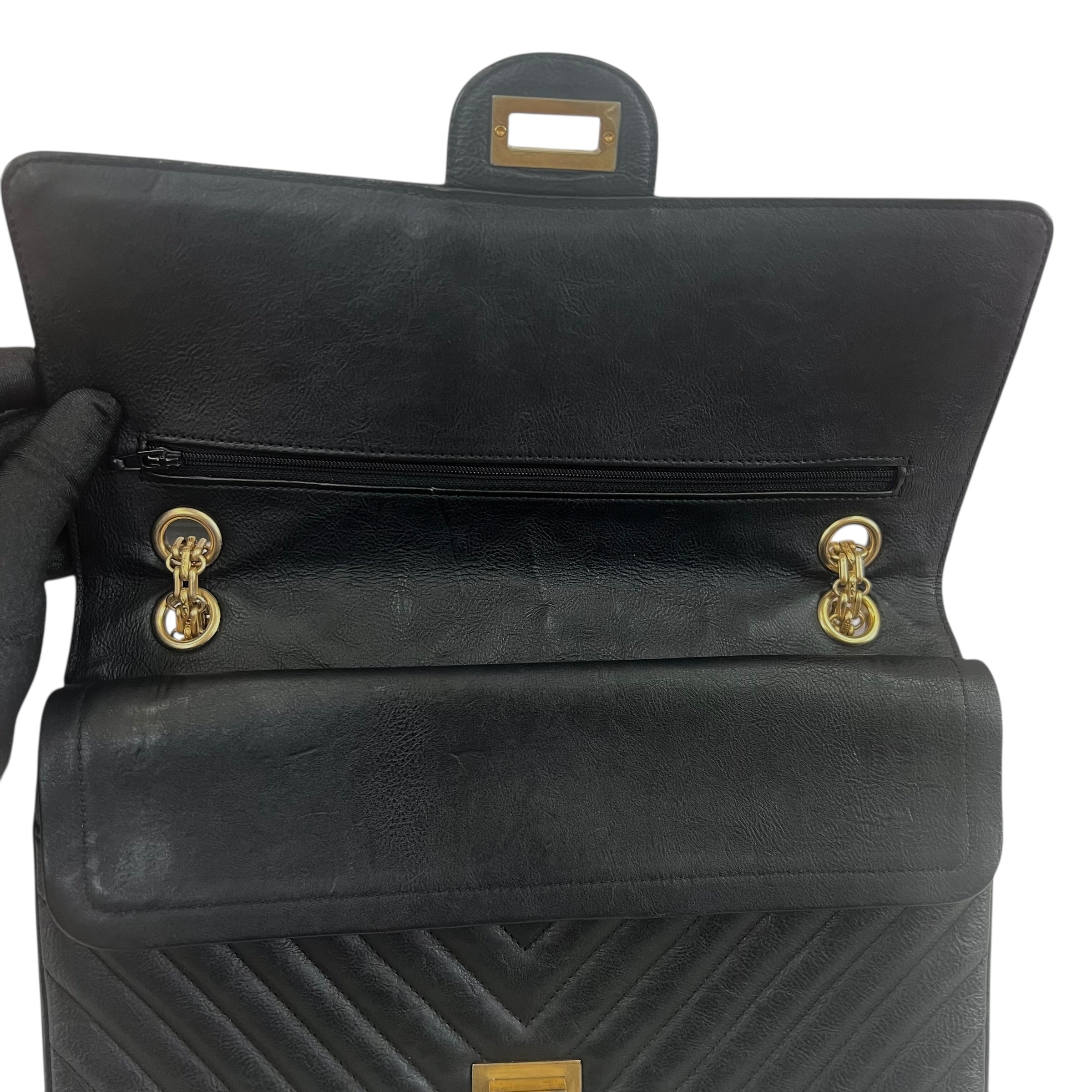 Pre-owned chanel-classic-timeless-2-55-black-caviar-leather-gold-hardware-bag-front
