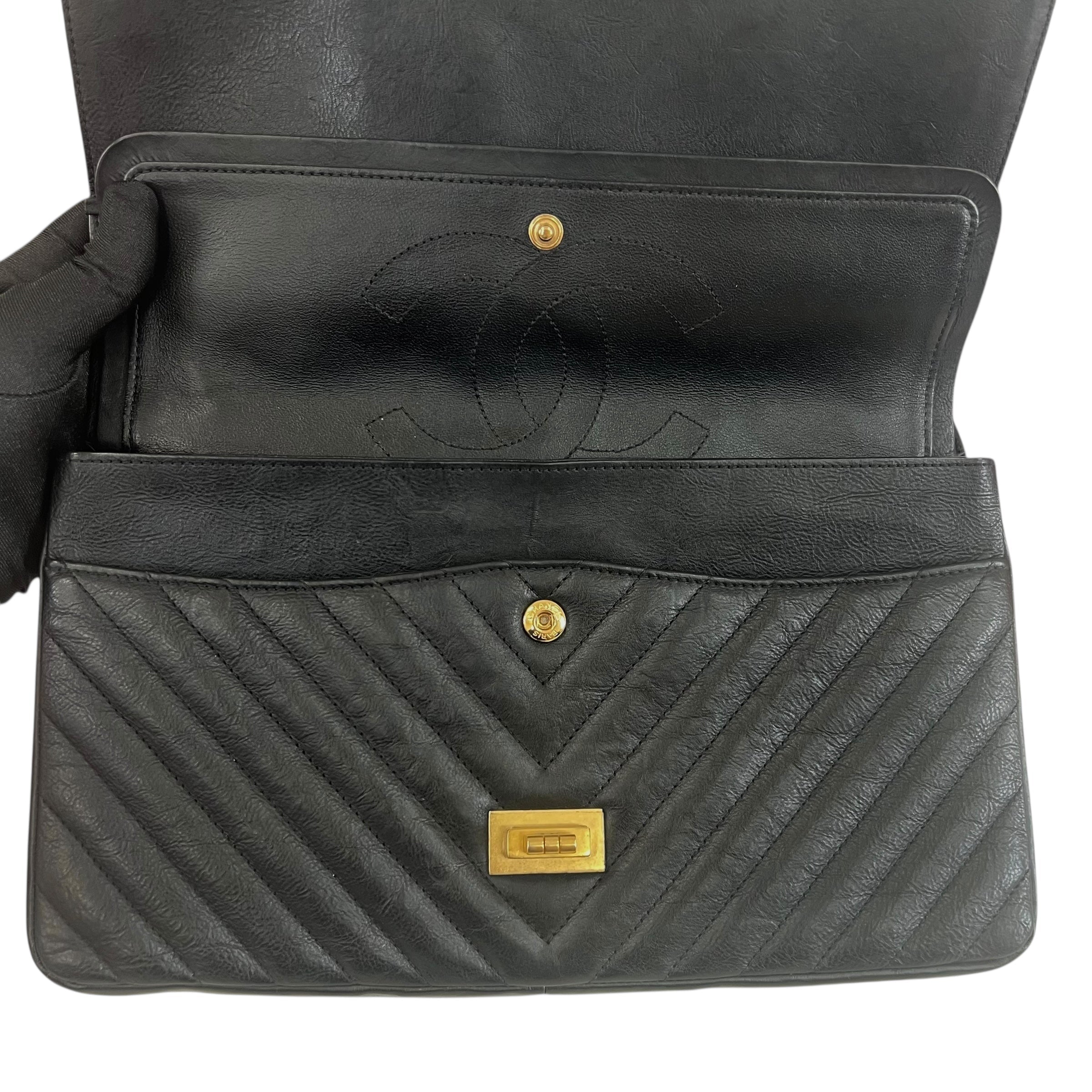 Pre-owned chanel-classic-timeless-2-55-black-caviar-leather-gold-hardware-bag-front