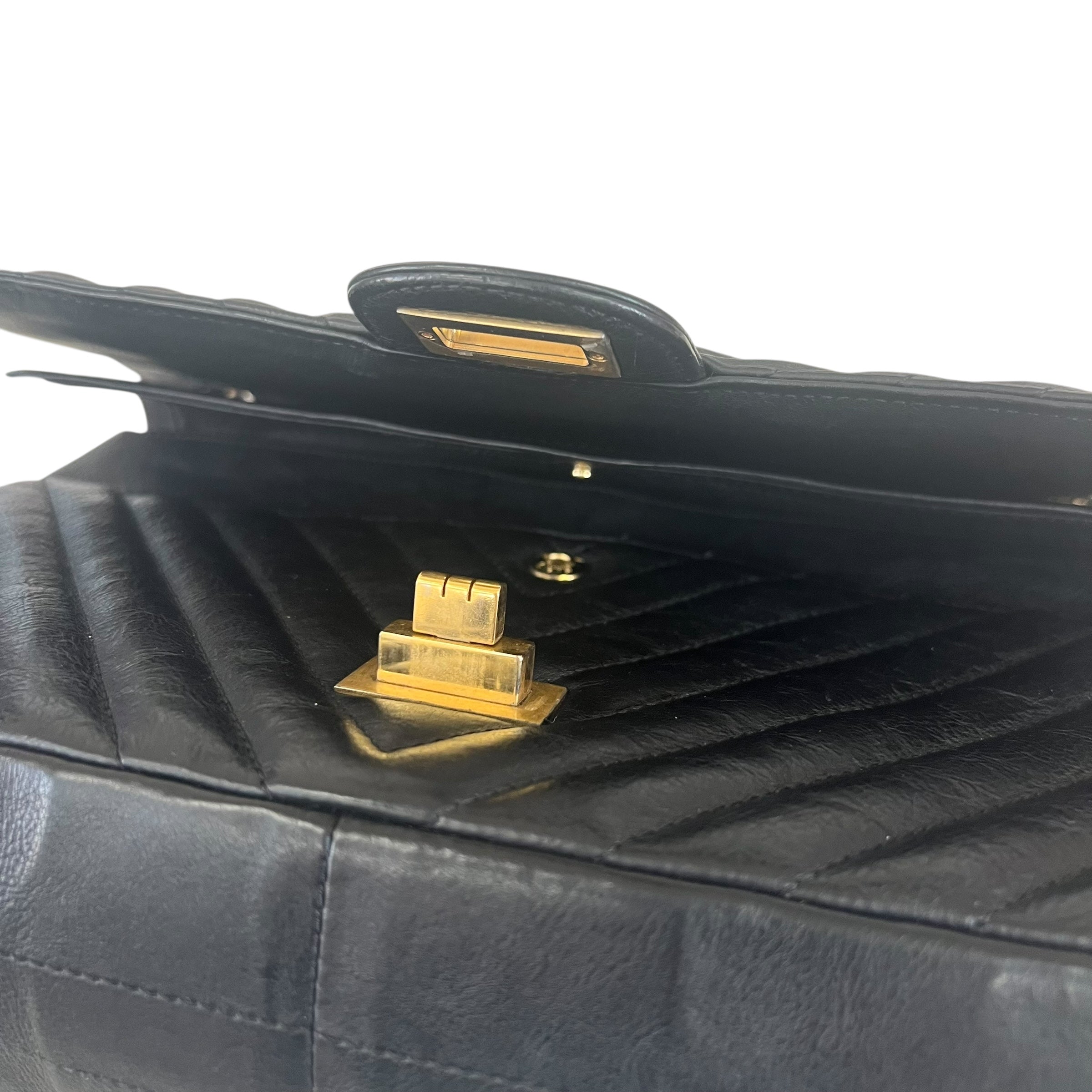 Pre-owned chanel-classic-timeless-2-55-black-caviar-leather-gold-hardware-bag-front