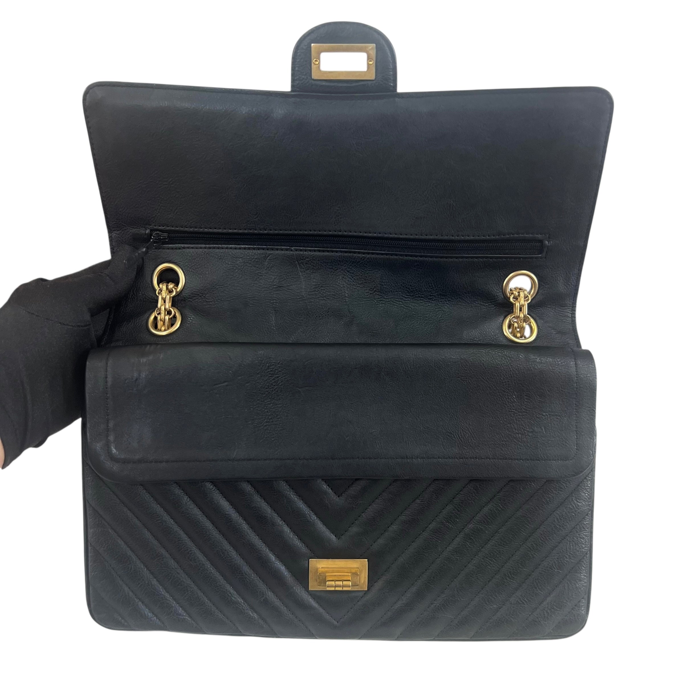 Pre-owned chanel-classic-timeless-2-55-black-caviar-leather-gold-hardware-bag-front