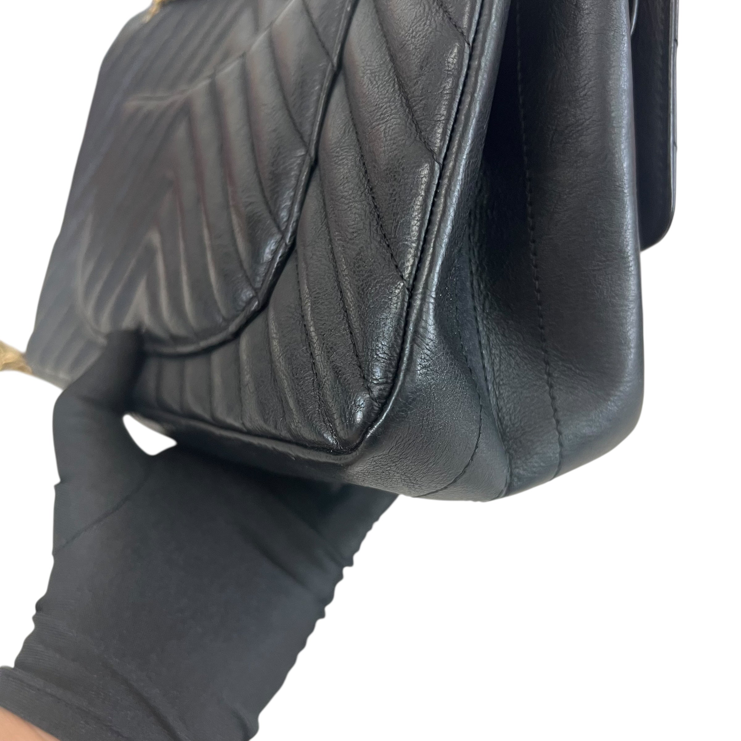 Pre-owned chanel-classic-timeless-2-55-black-caviar-leather-gold-hardware-bag-front
