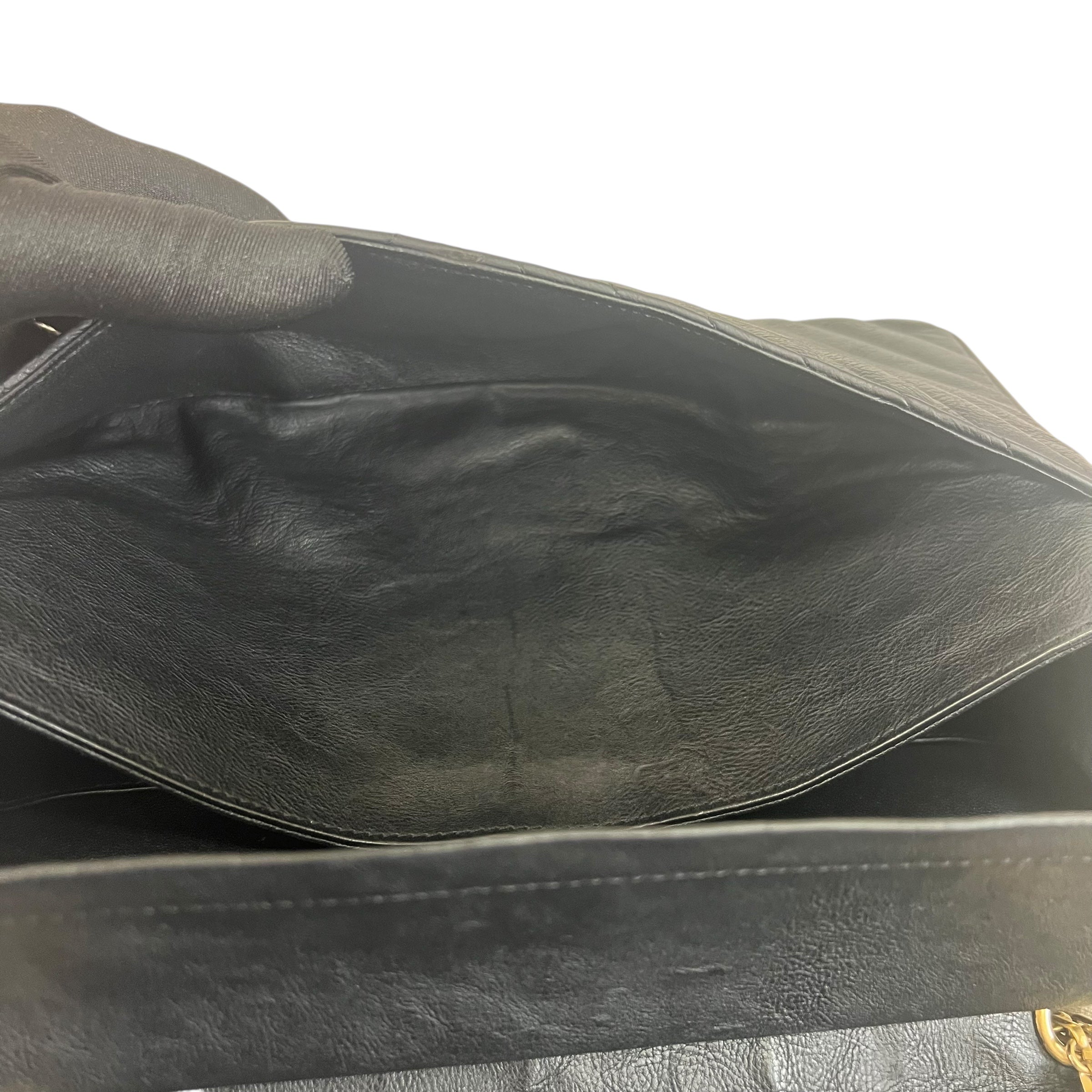 Pre-owned chanel-classic-timeless-2-55-black-caviar-leather-gold-hardware-bag-front