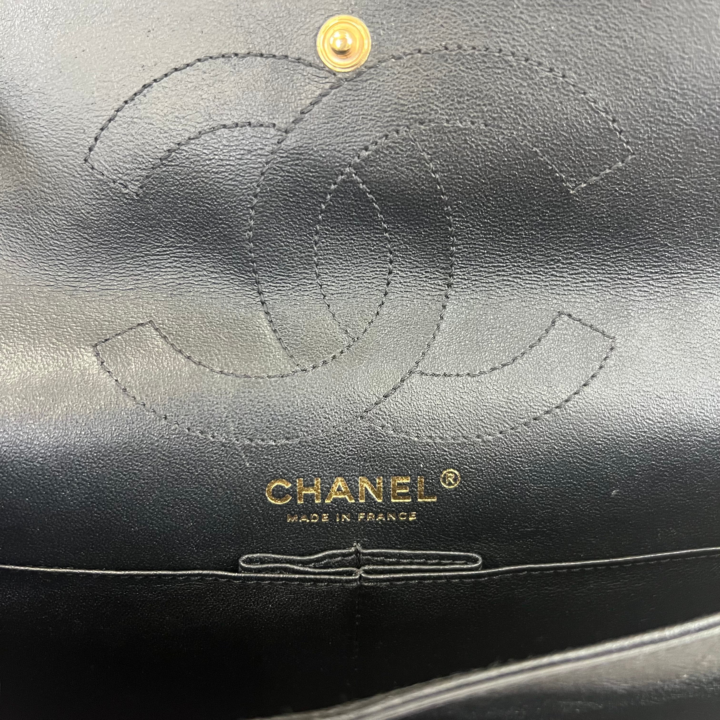 Pre-owned chanel-classic-timeless-2-55-black-caviar-leather-gold-hardware-bag-front