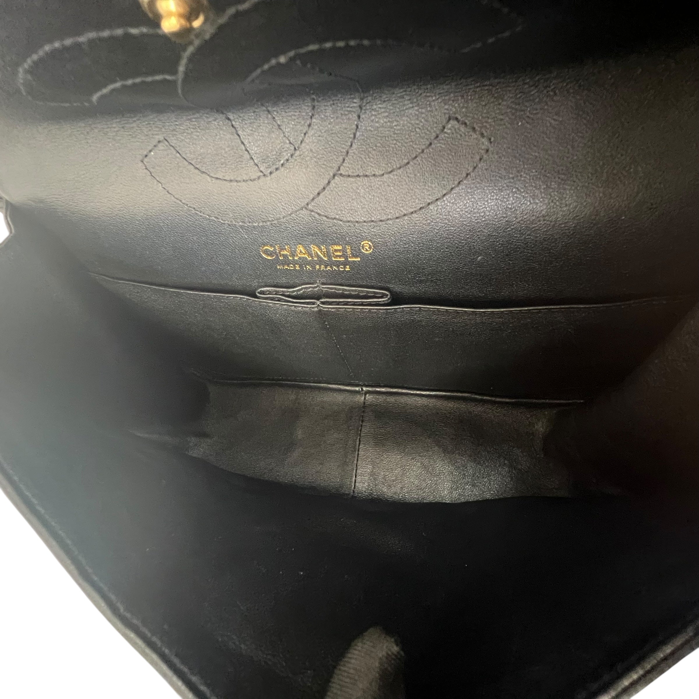 Pre-owned chanel-classic-timeless-2-55-black-caviar-leather-gold-hardware-bag-front