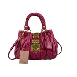 Pre-owned miu miu matelasse two-handle shoulder bag front back view
