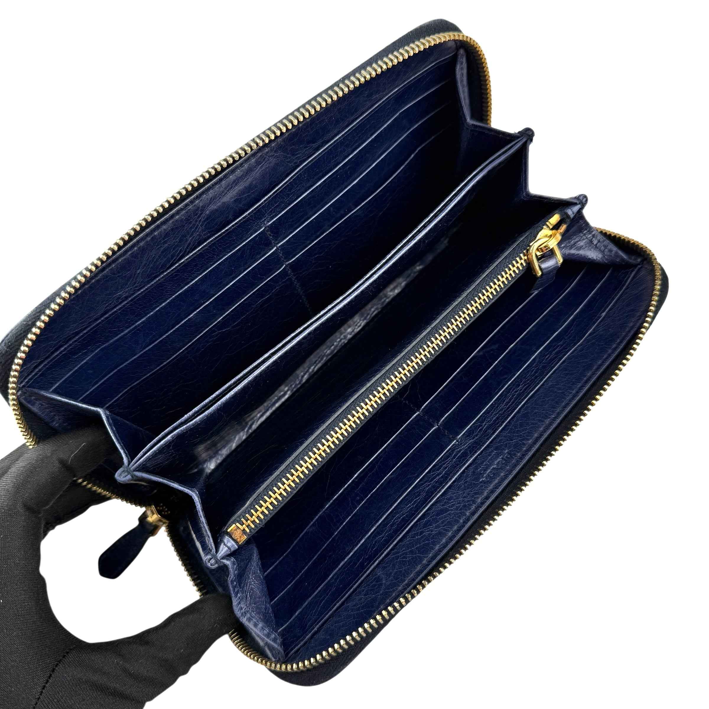 Prada calfskin zip around wallet