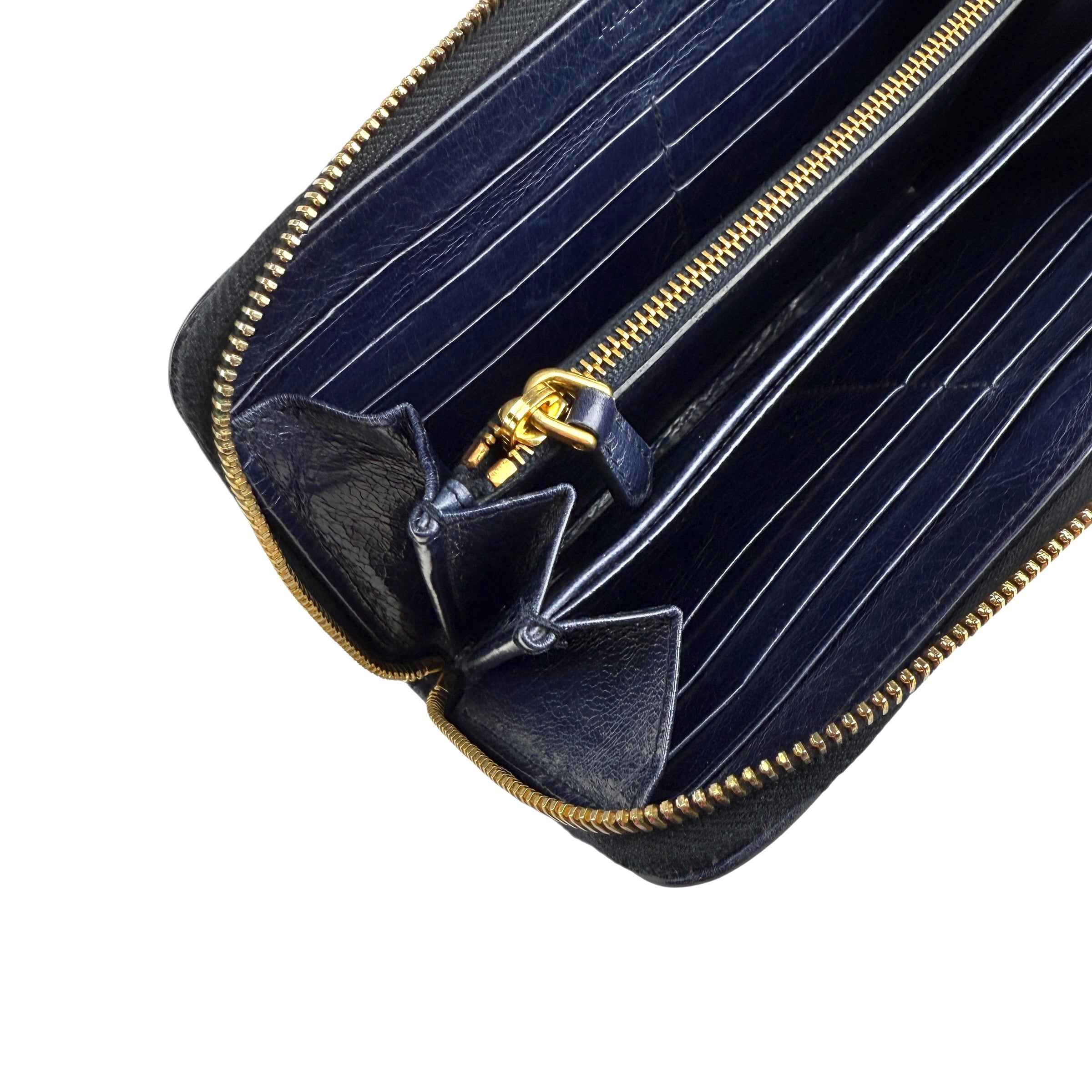 Prada calfskin zip around wallet