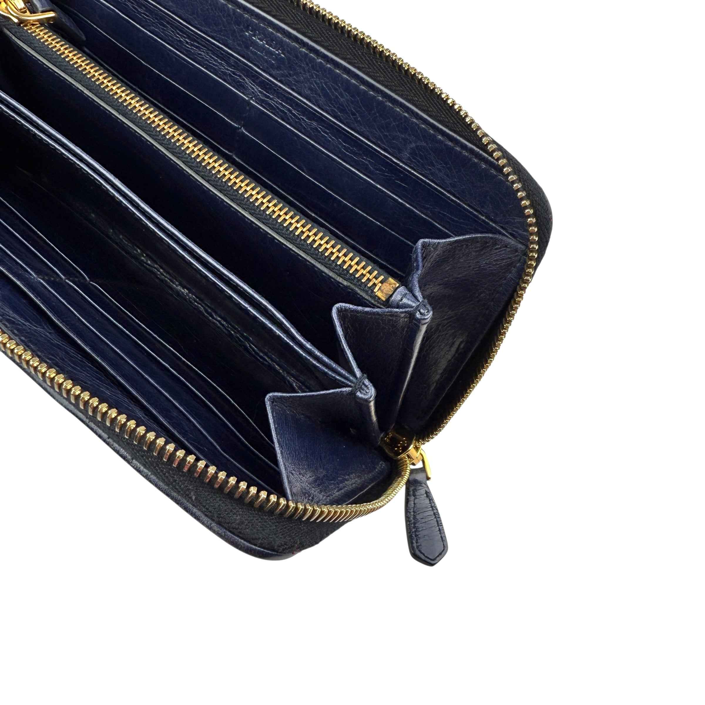 Prada calfskin zip around wallet