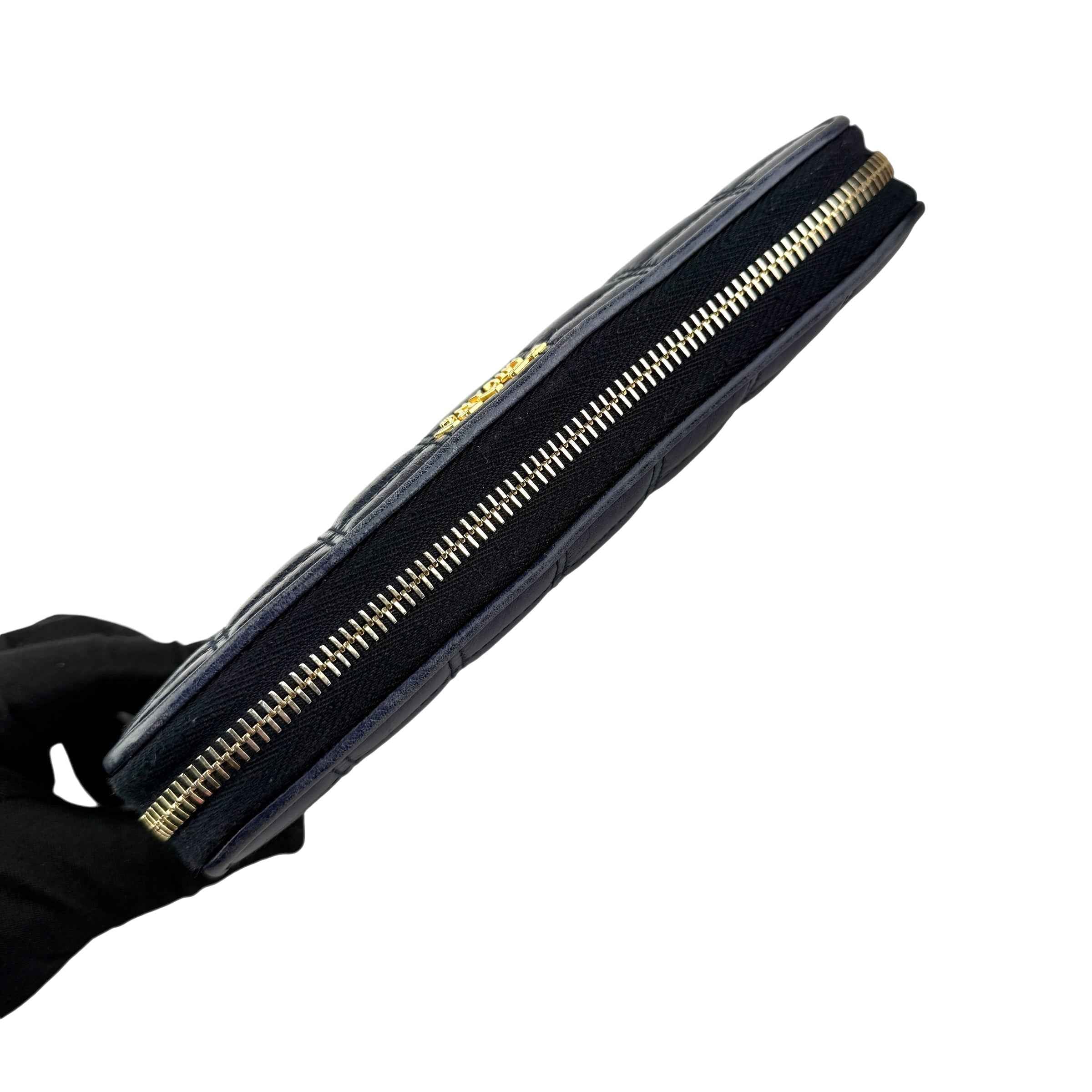 Prada calfskin zip around wallet