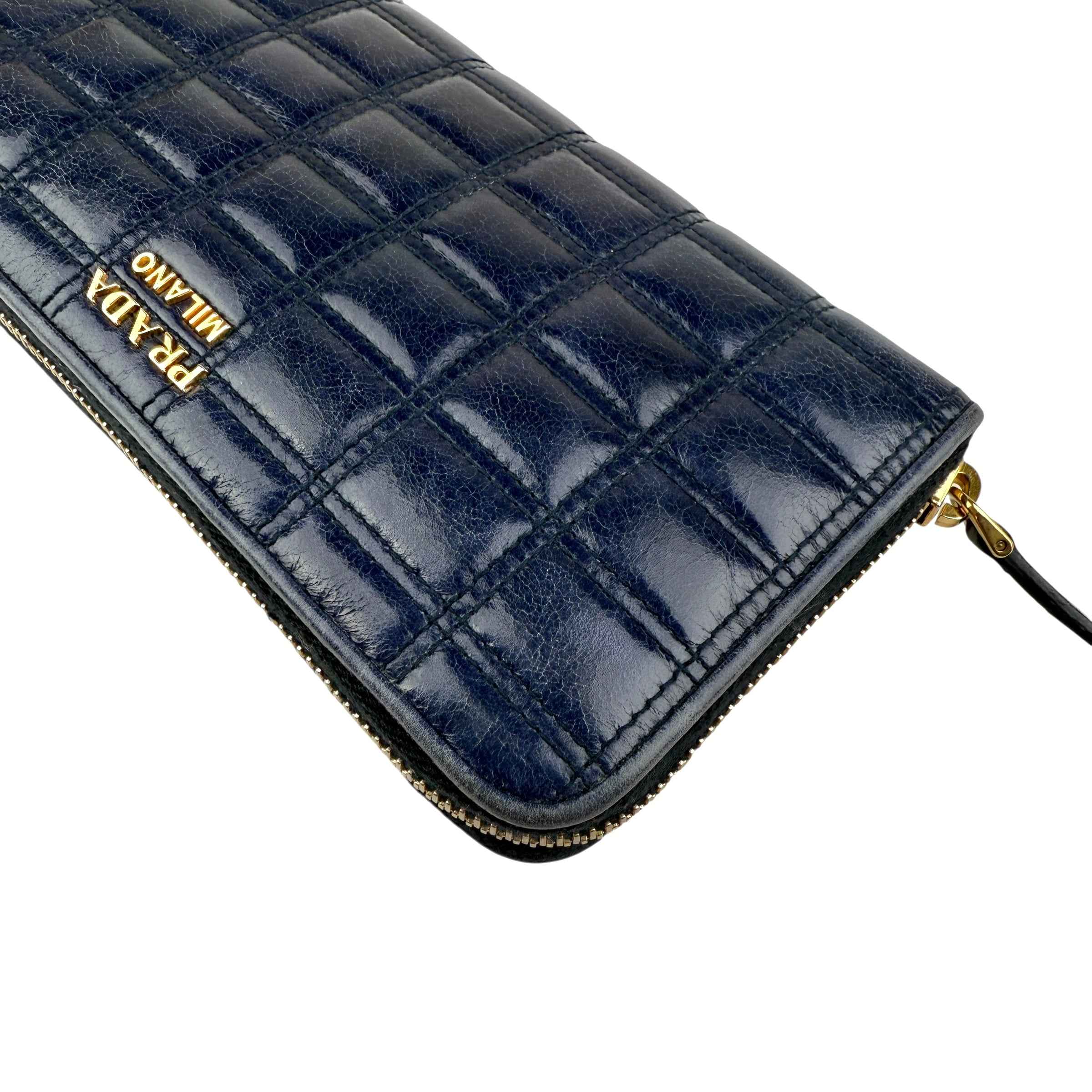 Prada calfskin zip around wallet