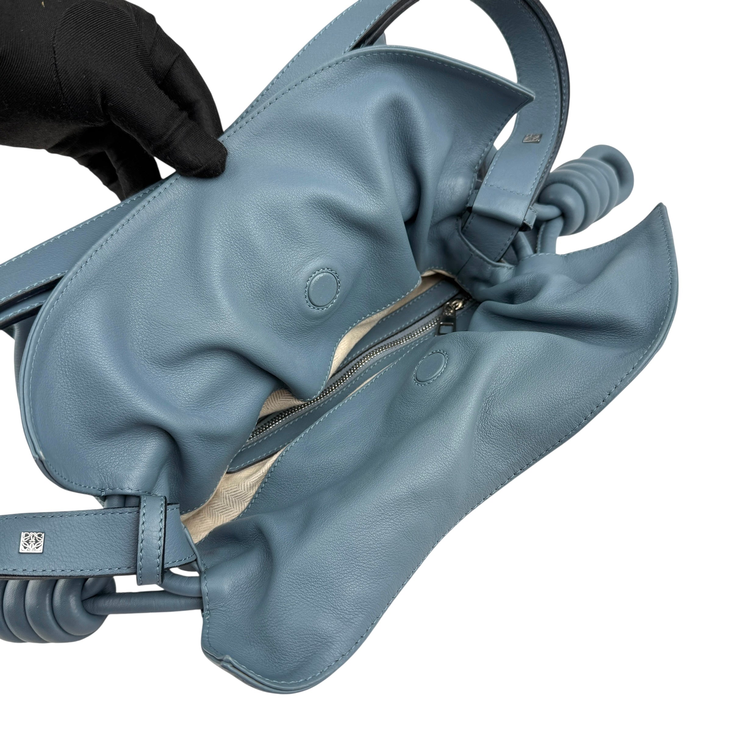 Pre-owned loewe flamenco mini napa drawstring clutch bag front