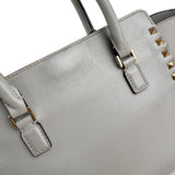 Pre-owned valentino grey leather rockstud trapeze handbag front