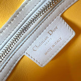 Dior Lady Dior model handbag in Bleu Pale, yellow and grey leather cannage