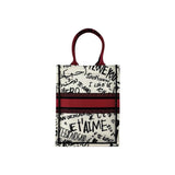 Dior White and Red Embroidered Canvas Dioramour Graffiti Vertical Book Tote