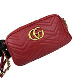 gucci red quilted leather marmont matelasse camera bag left front 45