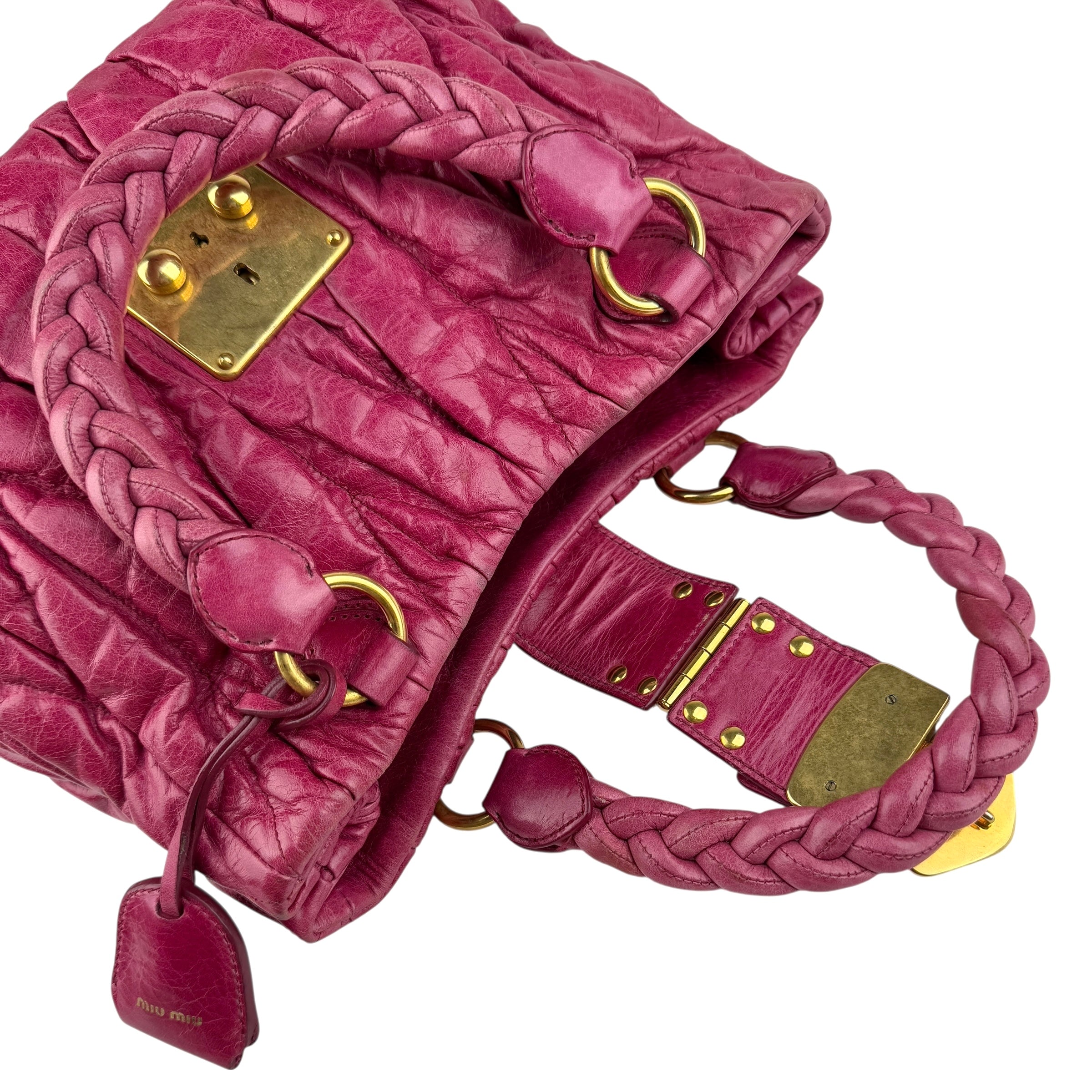miu miu matelasse two-handle shoulder bag left front 45