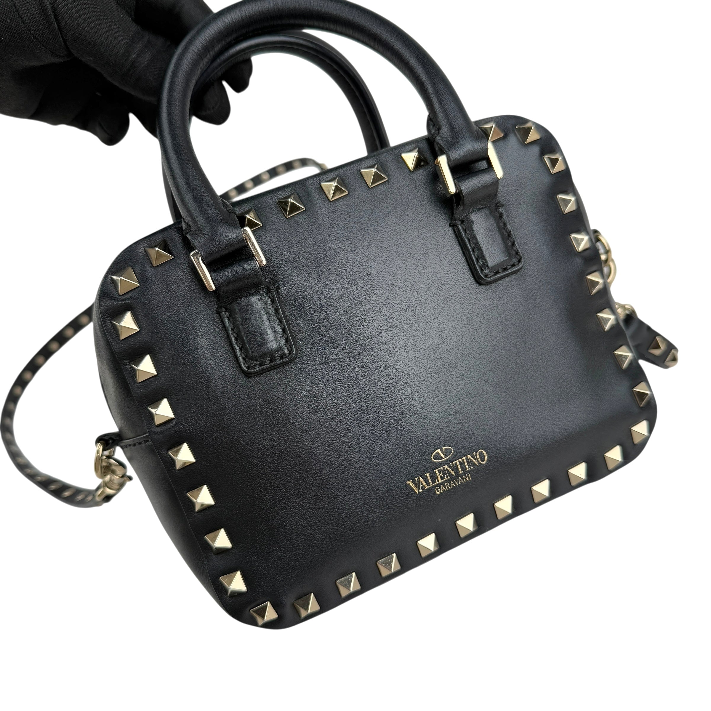 valentino black leather rockstud crossbody bag left front 45